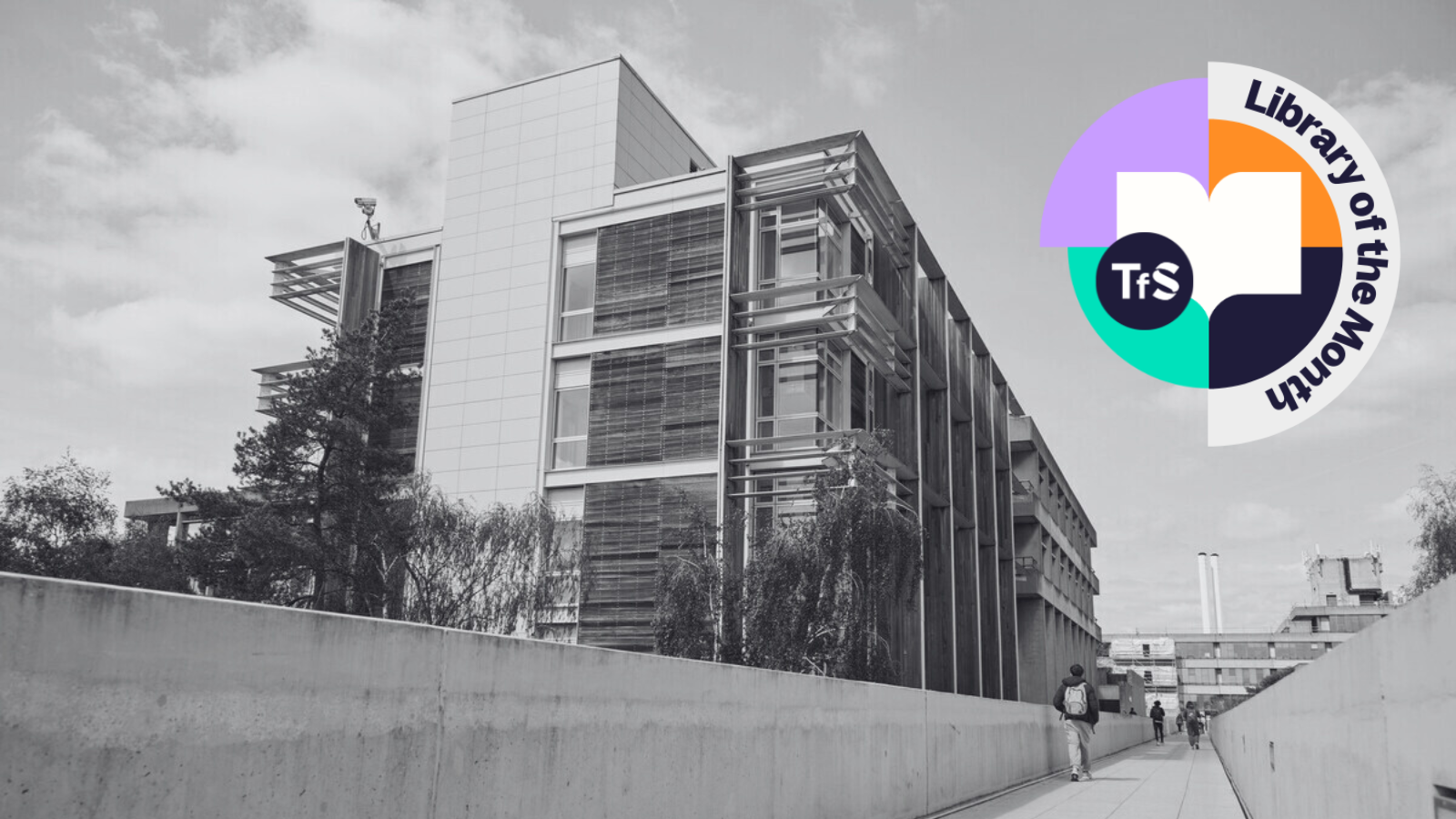 Black and white image of University of East Anglia library with Library of the Month logo in the top left corner