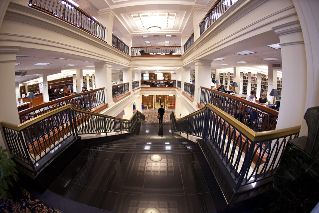 A photo showing the inside of Samford University library with bookshelves