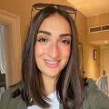 Photo of woman with brown hair smiling